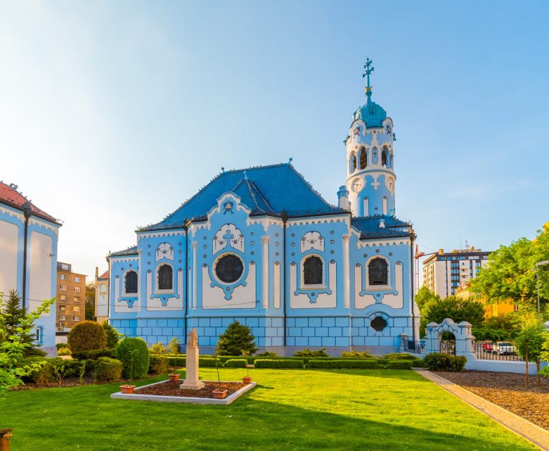 Slovakia by train blue church