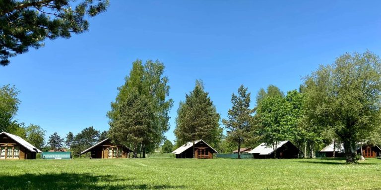 wooden chalet of Varin camping during active school group tour to Slovakia