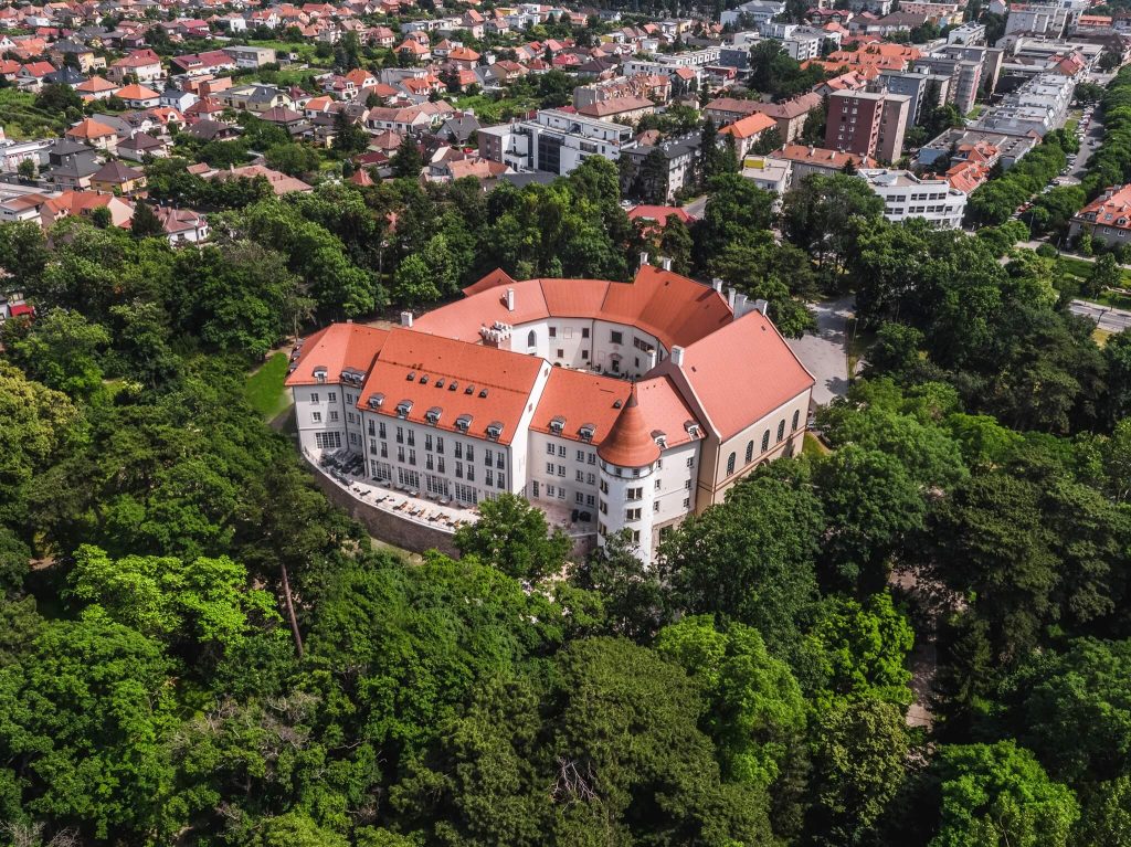 Drone photo of Palace Art Hotel Pezinok, use as accommodation at golf incentive program in Slovakia
