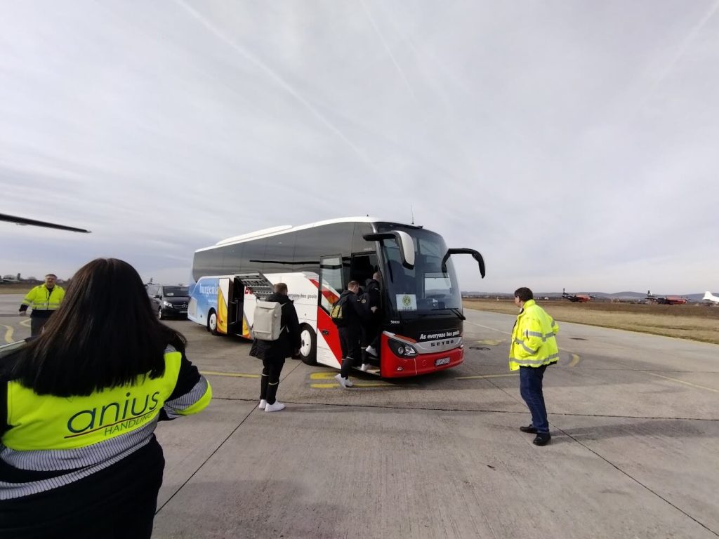 people getting on the bus of Blaguss at Piestany airport