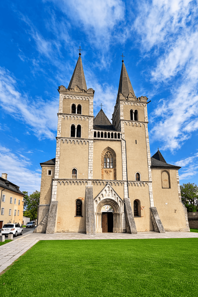 What a gorgeous shot of St. Martin's Cathedral at Spiš Chapter! 🏛️ Those twin towers against the blue sky are breathtaking. Let me slot it into the matching section right away