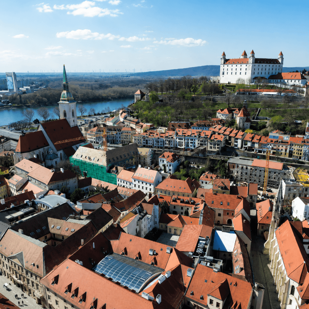 Aerial view of Bratislava Old Town with Bratislava Castle and the Danube river — city break base for the Wine Harvest Festival Slovakia group tour