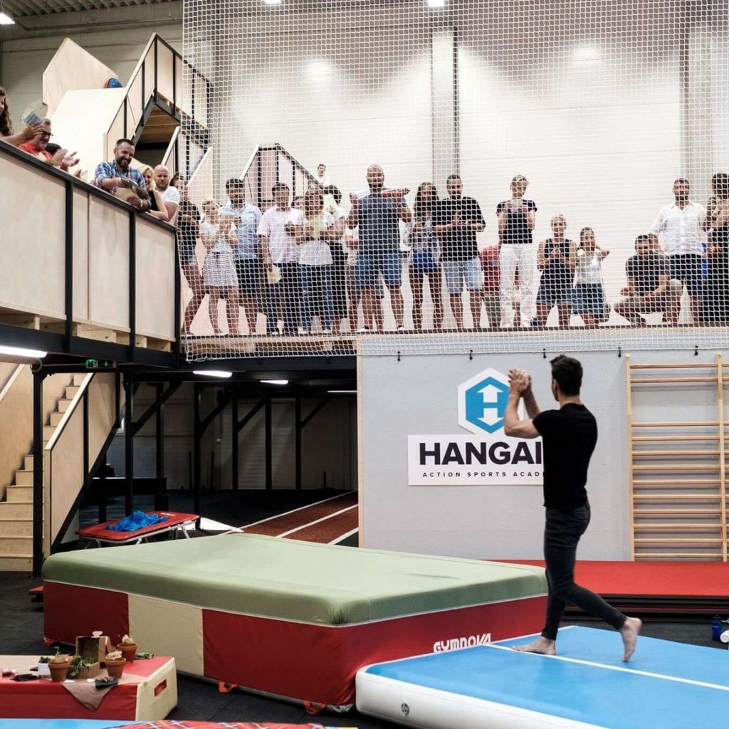 Corporate group watching team building activity at Hangar Action Sports Academy Bratislava