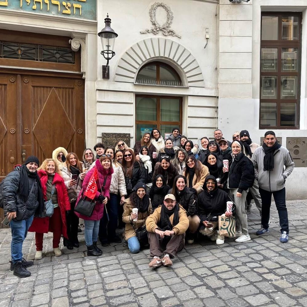 Large group on guided walking tour in Bratislava's historic Jewish quarter